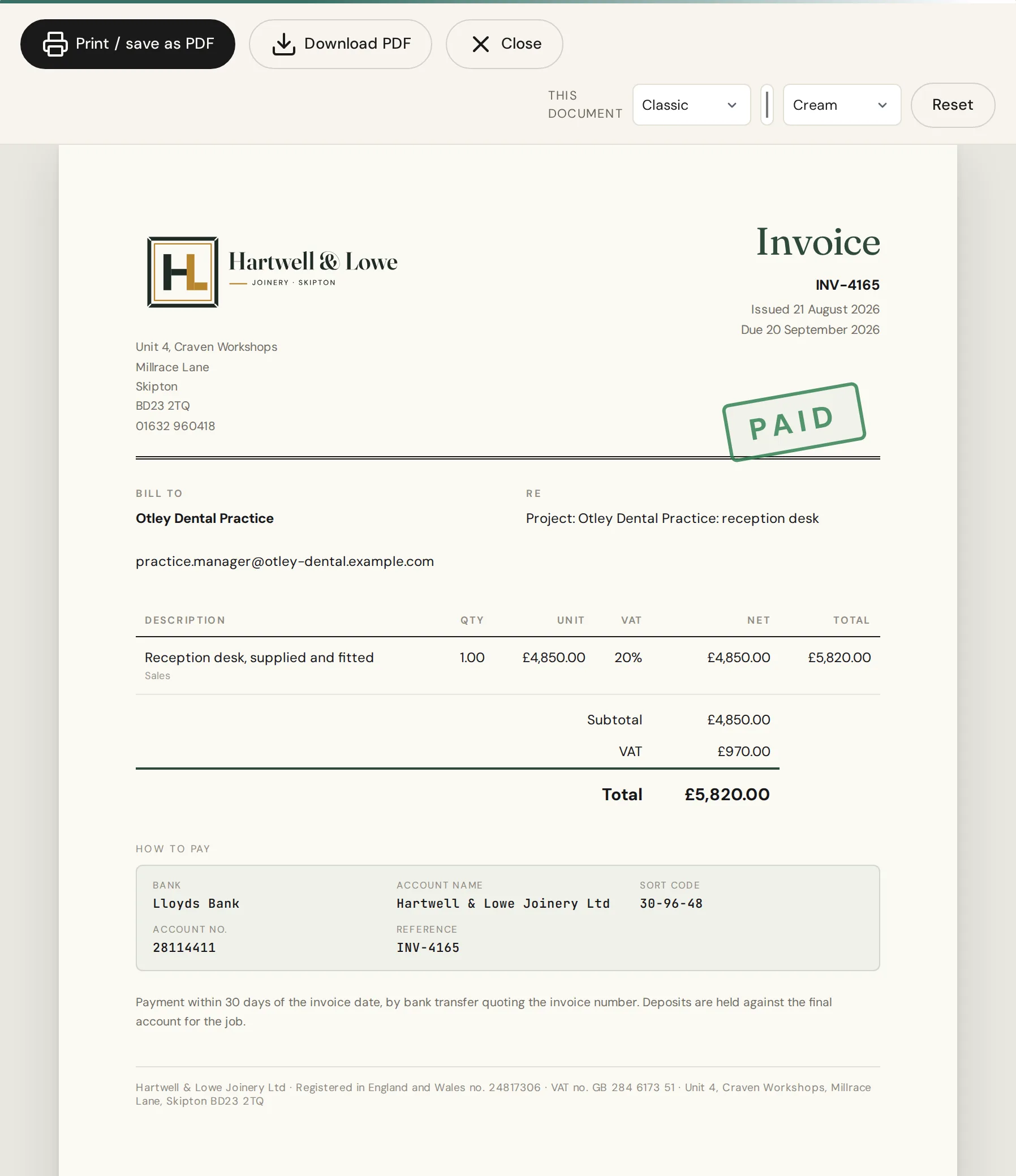 An IQ Books invoice in the Classic design, stamped paid